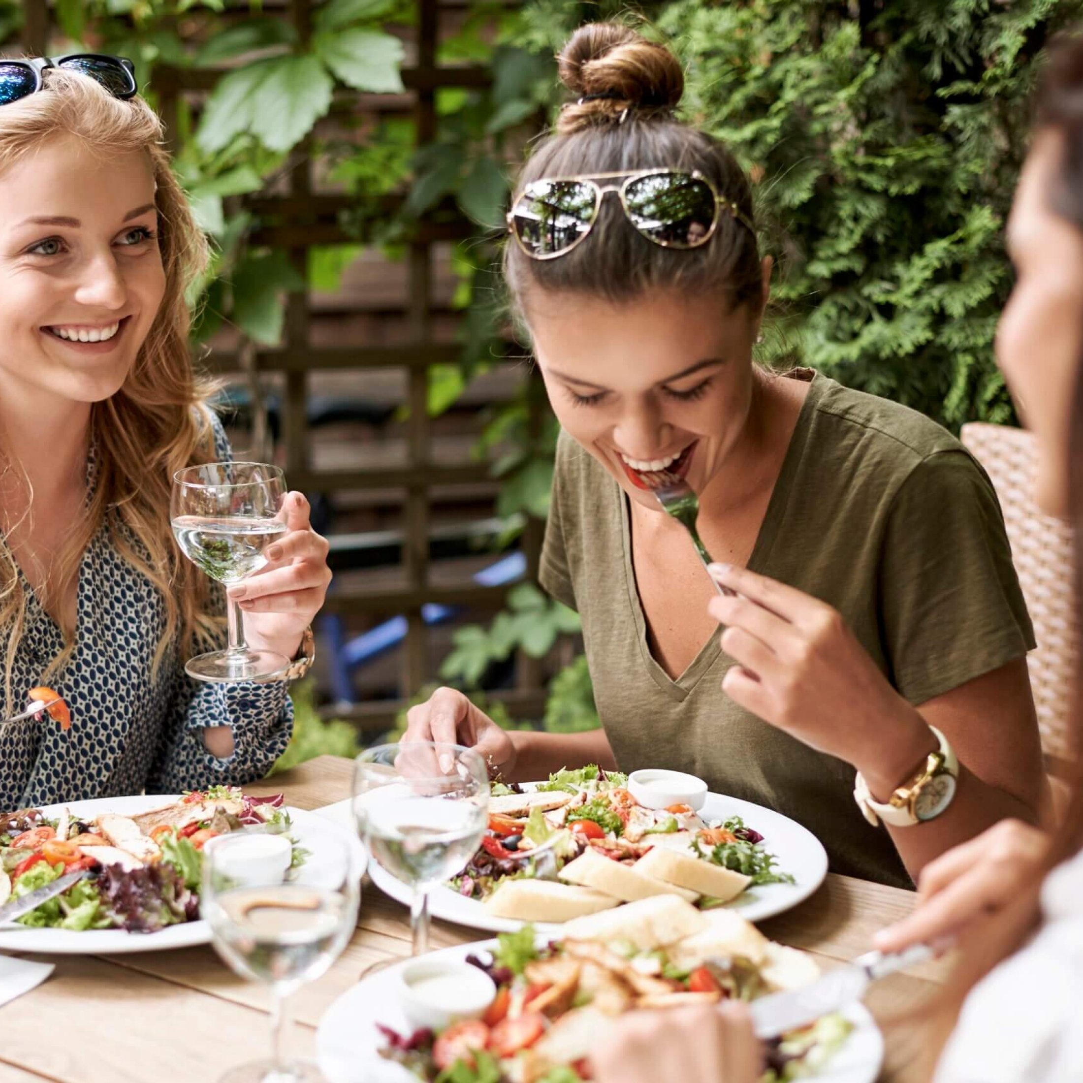 Meeting of girls at the fashion restaurant